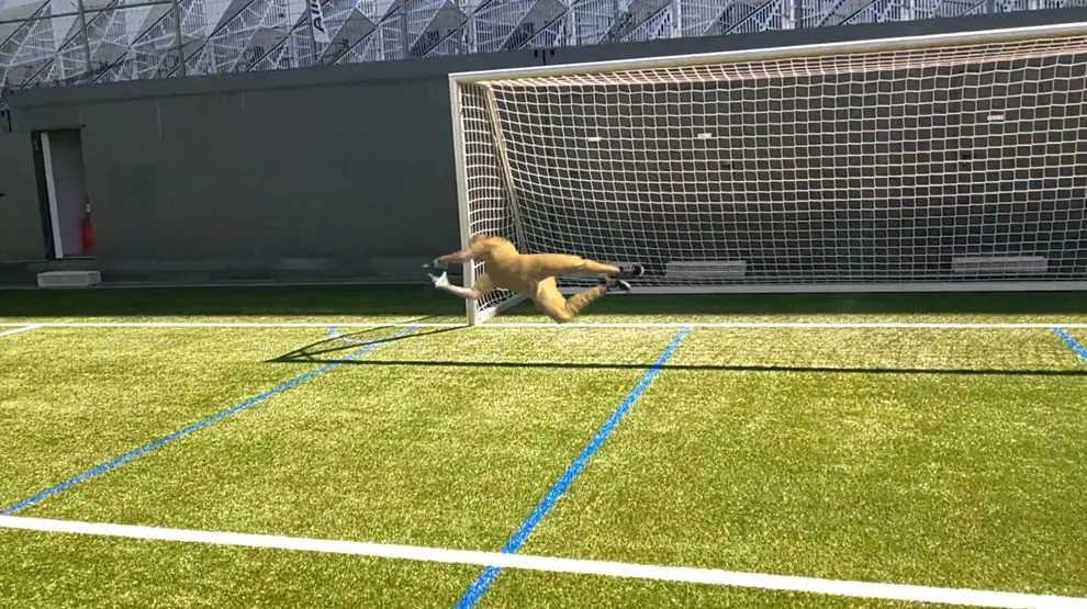 Seen through the Microsoft HoloLens 2: the holographic goalkeeper dives in a real goal, on a real pitch.